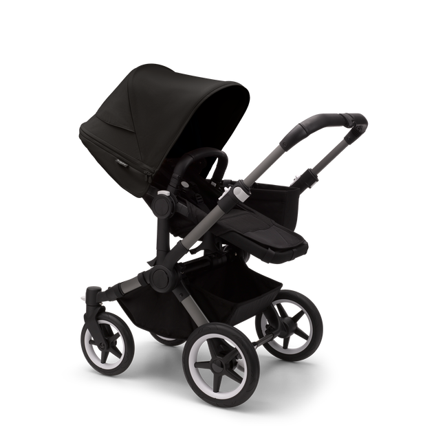 Bugaboo Donkey 5 Mono seat stroller with graphite chassis, midnight black fabrics and midnight black sun canopy.