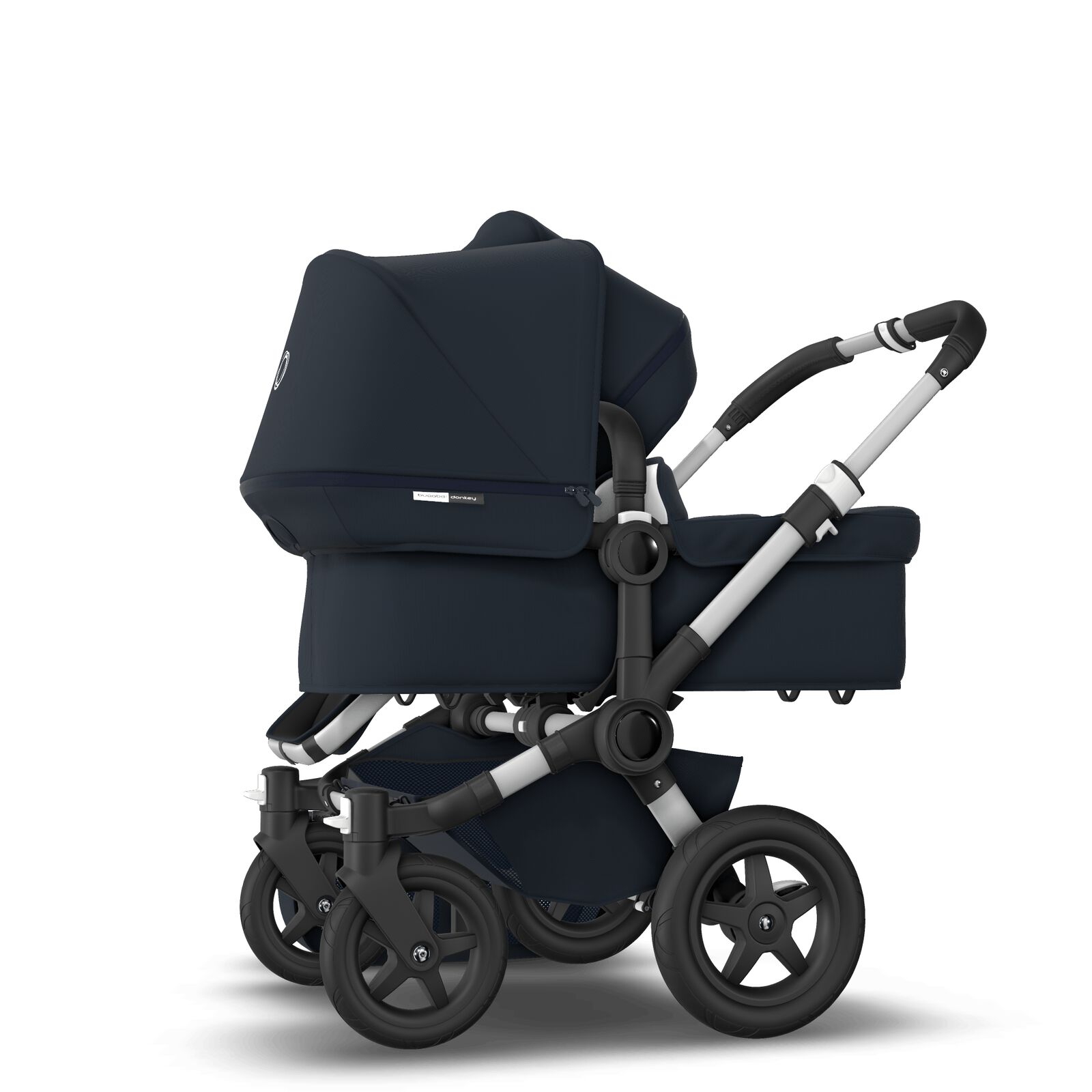 Bugaboo Donkey 2 Duo Seat And Bassinet Stroller Classic Collection Dark Navy Sun Canopy Classic Collection Dark Navy Fabrics Aluminum Chassis Bugaboo Us The winter accessory combines the collection's light petrol fabric with bold. us d2d stroller bundleclassic dn alu