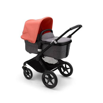 Bugaboo Fox 3 carrycot pushchair with black frame, grey melange fabrics, and red sun canopy.