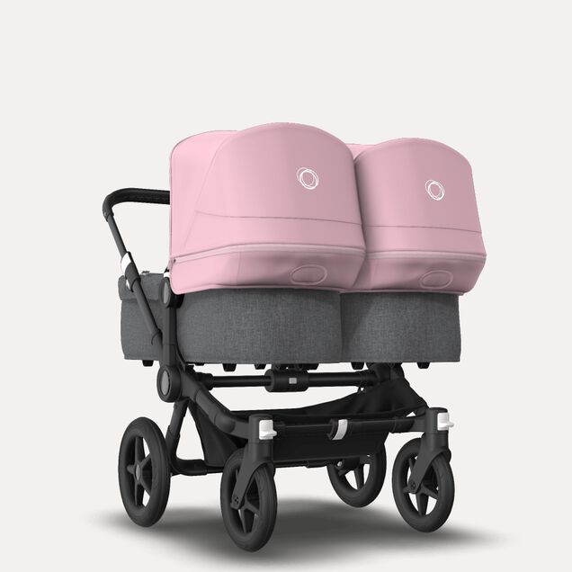 Bugaboo Donkey 3 Twin seat and carrycot pushchair soft pink sun canopy, grey melange fabrics, black base - Main Image Slide 1 of 9