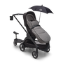 Bugaboo Dragonfly pram with various accessories: sun canopy, footmuff, cup holder and comfort wheeled board.