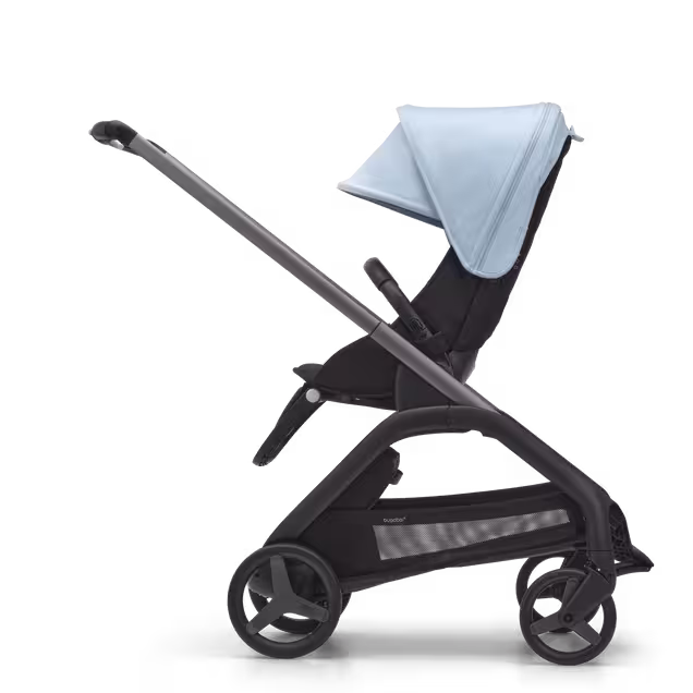 Side view of the Bugaboo Dragonfly seat stroller with graphite chassis, midnight black fabrics and skyline blue sun canopy. - Main Image Slide 2 of 16