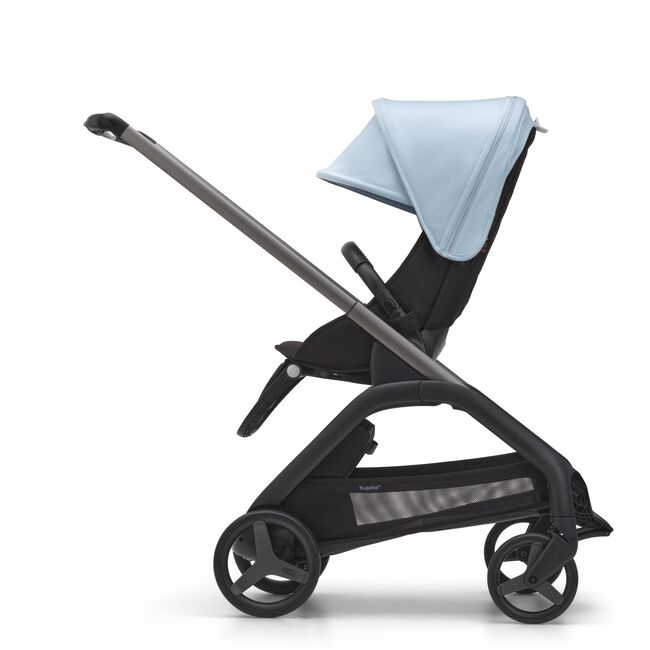 Side view of the Bugaboo Dragonfly seat stroller with graphite chassis, midnight black fabrics and skyline blue sun canopy.