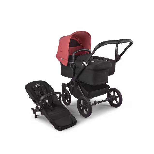 Refurbished Bugaboo Donkey 5 Mono bassinet and seat stroller black base, midnight black fabrics, sunrise red sun canopy - Main Image Slide 1 of 10