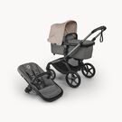 Bugaboo Fox 5 Renew bassinet and seat 2-in-1 stroller, with graphite chassis, Moon Grey fabrics, and Desert Taupe Mélange sun canopy.