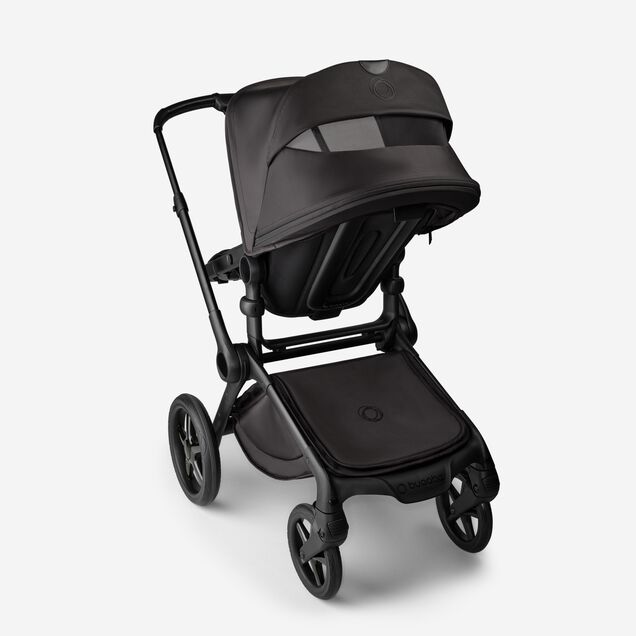 Back view of the Bugaboo Fox 5 Noir Limited Edition stroller in Black Moonlight, with the sun canopy's peek-a-boo panel visible. - Main Image Slide 5 of 15