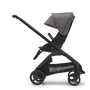 Side view of the Bugaboo Dragonfly seat stroller with black chassis, midnight black fabrics and grey melange sun canopy.