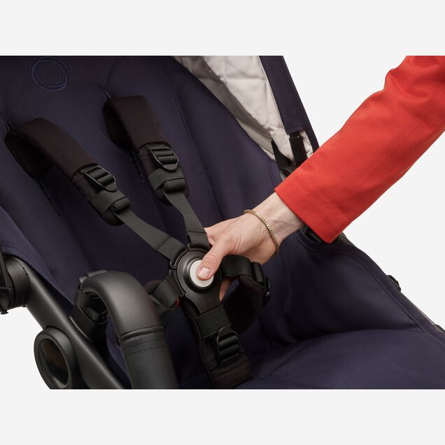 Unfastening a 5-point safety harness on the Fox 3. - Main Image Slide 9 of 13