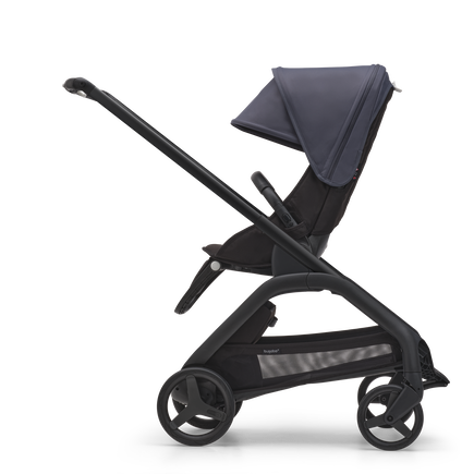 Side view of the Bugaboo Dragonfly seat stroller with black chassis, midnight black fabrics and stormy blue sun canopy. - view 2