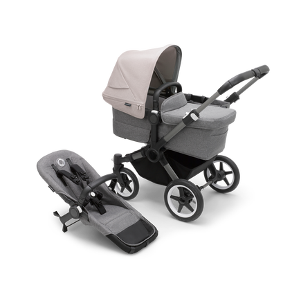 Bugaboo Donkey 5 Mono bassinet stroller with graphite chassis, grey melange fabrics and misty white sun canopy, plus seat.