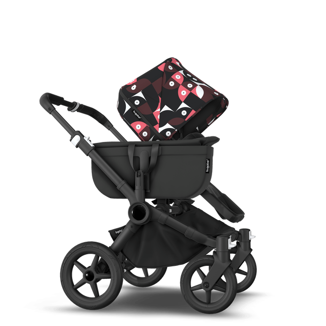Bugaboo Donkey 5 Mono bassinet and seat stroller black base, midnight black fabrics, animal explorer pink/ red sun canopy