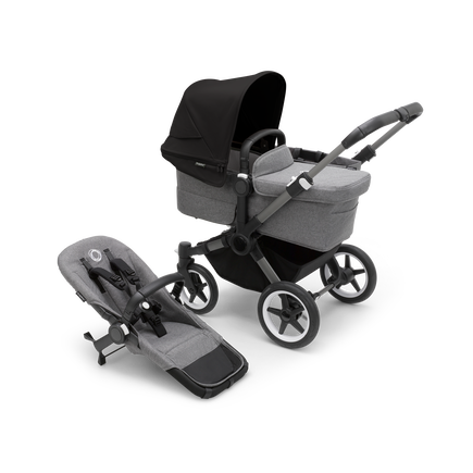 Bugaboo Donkey 5 Mono bassinet stroller with graphite chassis, grey melange fabrics and midnight black sun canopy, plus seat.