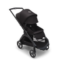 Bugaboo Dragonfly seat pushchair with black chassis, midnight black fabrics and midnight black sun canopy. The sun canopy is fully extended. - Thumbnail Slide 4 of 18