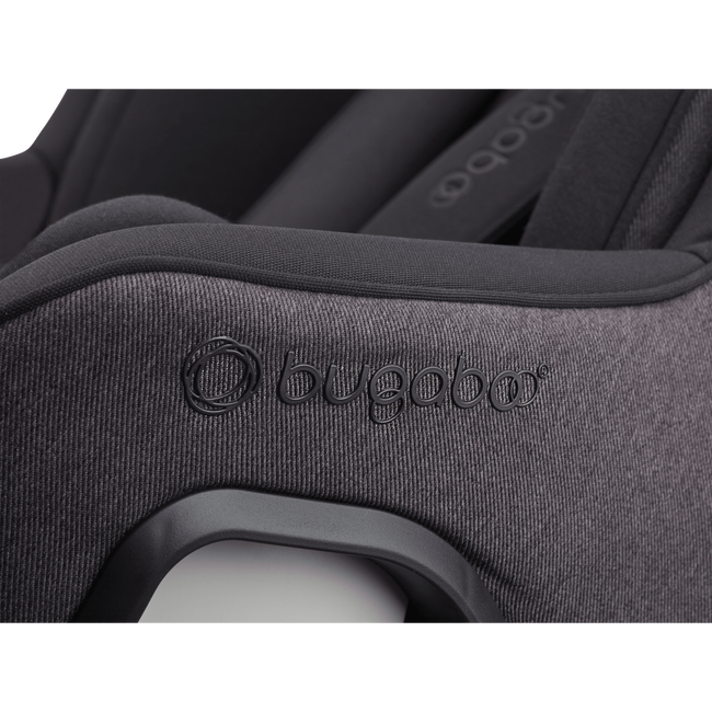 Close up of the embossed Bugaboo logo on the Bugaboo Owl by Nuna car seat in black fabrics.