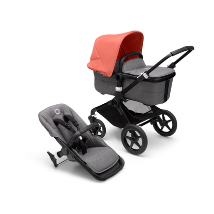 Bugaboo Fox 3 carrycot and seat pushchair with black frame, grey melange fabrics, and red sun canopy.
