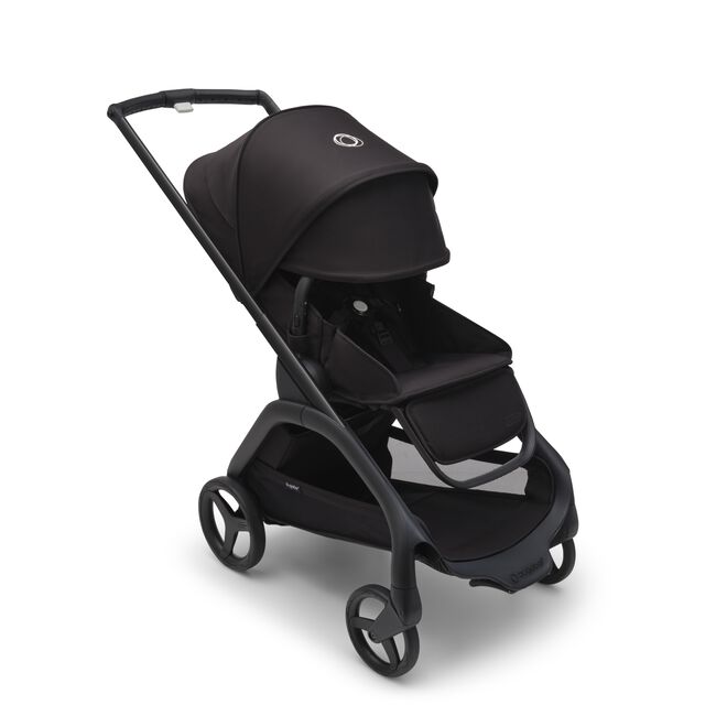 Bugaboo Dragonfly seat pram with black chassis, midnight black fabrics and midnight black sun canopy. The sun canopy is fully extended.
