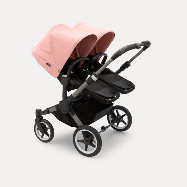 Bugaboo Donkey 5 twin stroller graphite base, midnight black fabrics, morning pink sun canopy - Main Image Slide 2 of 10