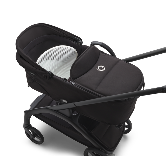 Top view of a Bugaboo Dragonfly stroller with bassinet showing the aerated mattress.