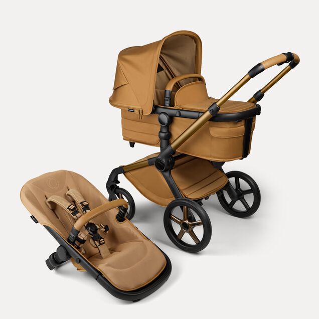 Bugaboo Fox 5 Noir Limited Edition carrycot and seat pushchair, with Amber Glow chassis, Amber Glow fabrics, and Amber Glow sun canopy. - Main Image Slide 1 of 15