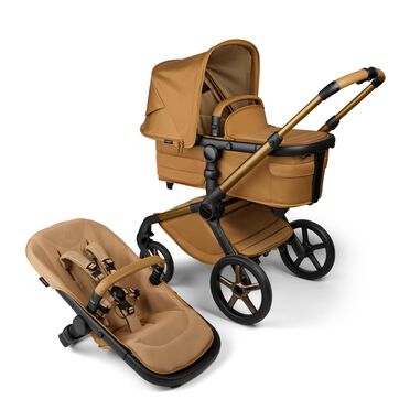 Bugaboo Fox 5 Noir Limited Edition carrycot and seat pushchair, with Amber Glow chassis, Amber Glow fabrics, and Amber Glow sun canopy.