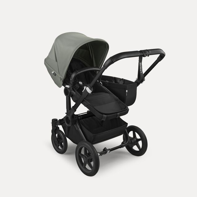 PP Bugaboo Donkey 5 Mono bassinet and seat stroller black base, midnight black fabrics, forest green sun canopy - Main Image Slide 2 of 4