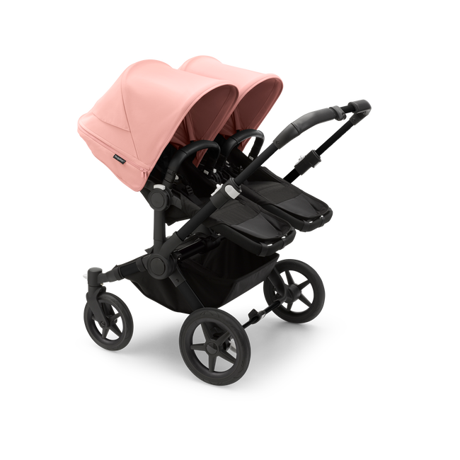 Bugaboo Donkey 5 Twin bassinet and seat stroller black base, midnight black fabrics, morning pink sun canopy