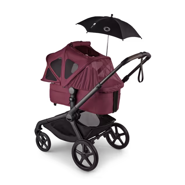 Bugaboo Kangaroo 2-in-1 stroller with a bassinet and a breezy sun canopy in Dark Cherry fabrics and a black parasol. The sun canopy is fully extended with the mosquito net covering the bassinet. - Main Image Slide 17 of 18