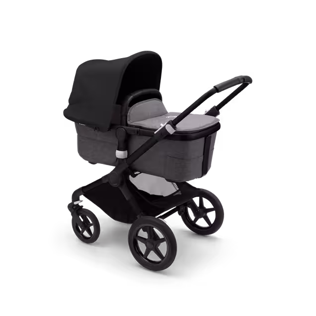 Bugaboo Fox 3 bassinet stroller with black frame, grey fabrics, and black sun canopy. - Main Image Slide 2 of 7