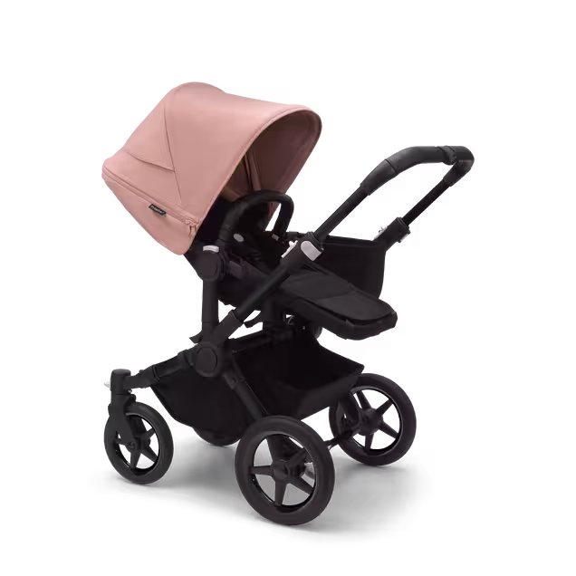 Refurbished Bugaboo Donkey 5 Mono bassinet and seat stroller black base, midnight black fabrics, morning pink sun canopy - Main Image Slide 2 of 9