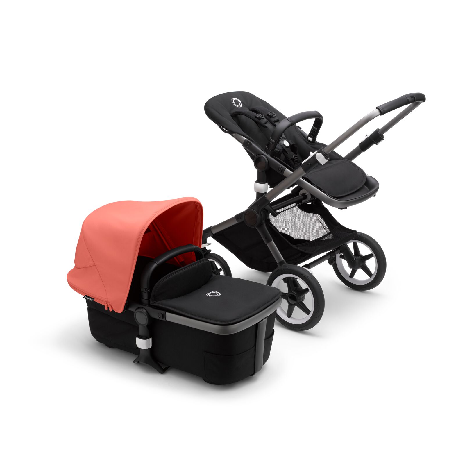 Bugaboo Fox 3 bassinet and seat stroller with graphite frame, black fabrics, and red sun canopy.