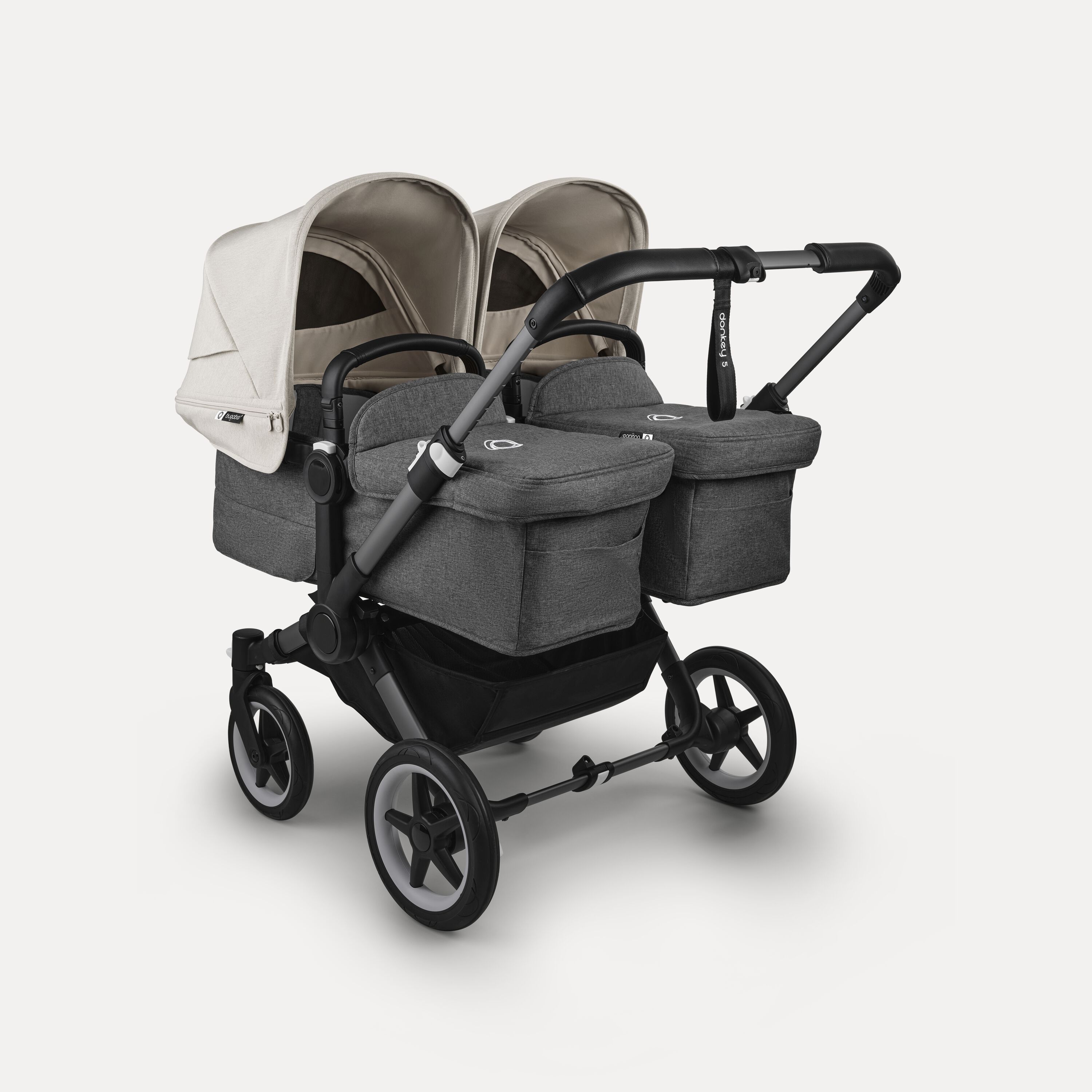 Bugaboo Donkey 5 twin stroller graphite base, grey mélange fabrics, misty white sun canopy - Main Modal Image Slide 1 of 12