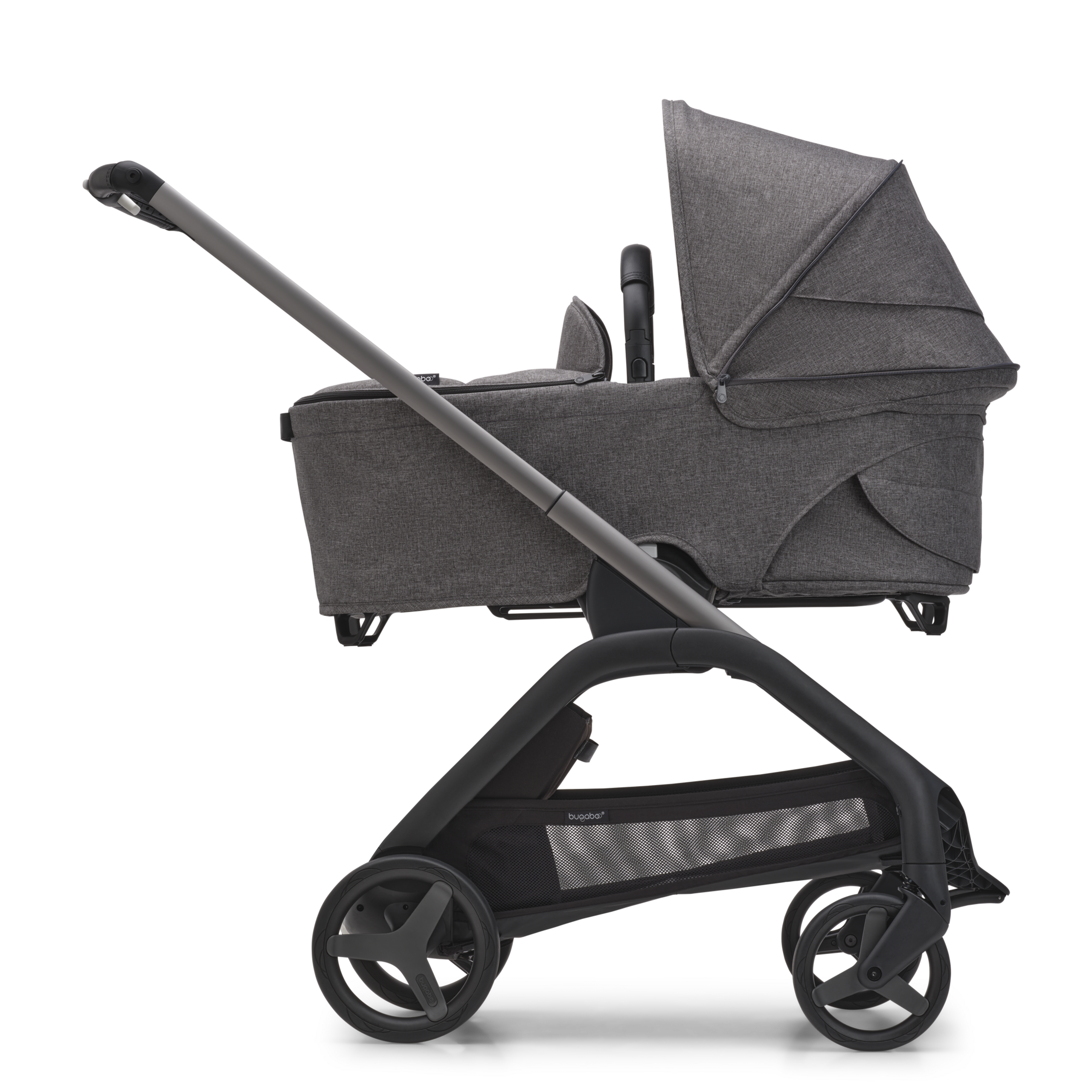 Side view of the Bugaboo Dragonfly bassinet stroller with graphite chassis, grey melange fabrics and grey melange sun canopy. - Thumbnail Slide 3 of 15