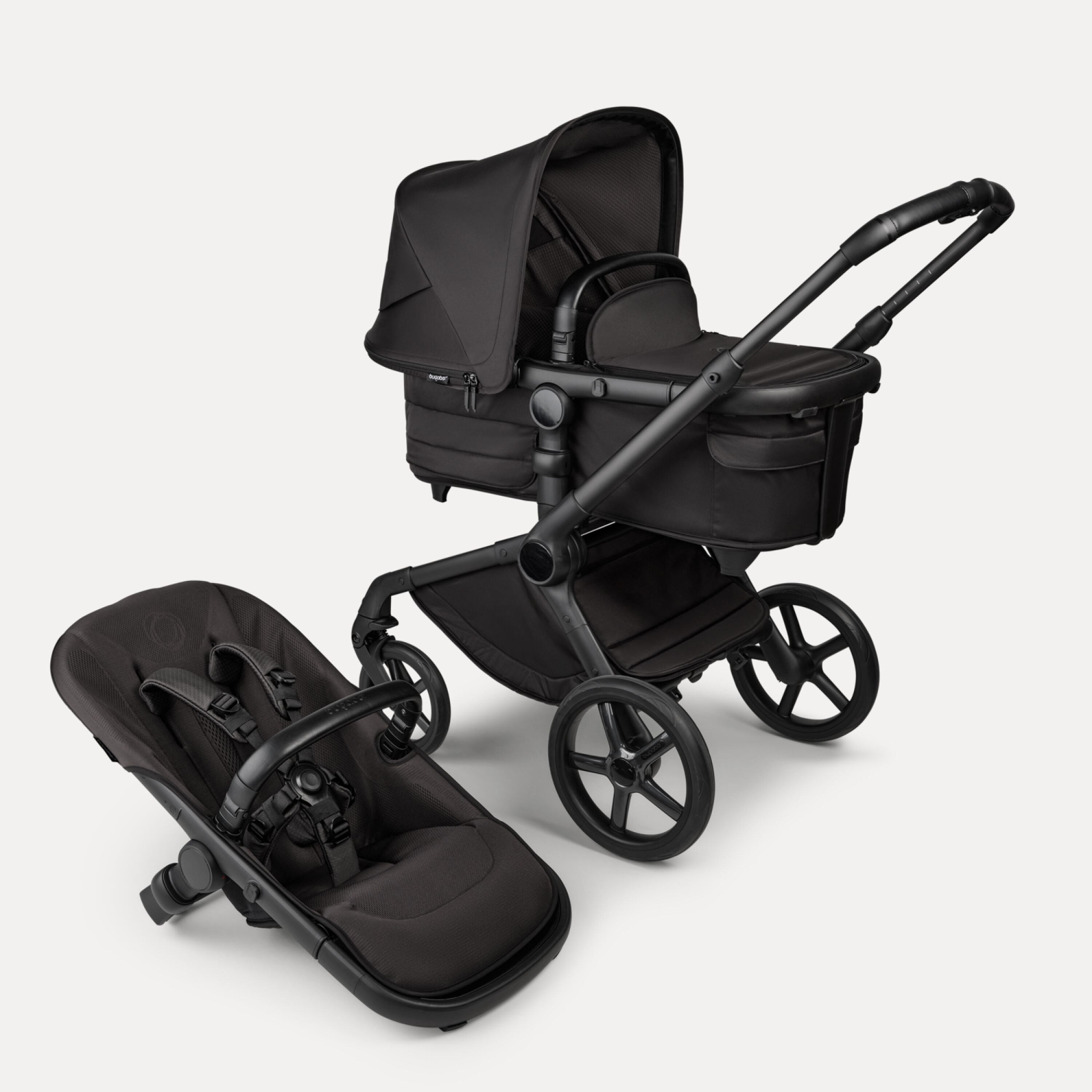 Bugaboo Fox 5 Noir Limited Edition bassinet and seat stroller, with Black Moonlight chassis, Black Moonlight fabrics, and Black Moonlight sun canopy. - Main Modal Image Slide 1 of 15