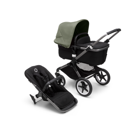 Bugaboo Fox 3 carrycot and seat pushchair with graphite frame, black fabrics, and forest green sun canopy.