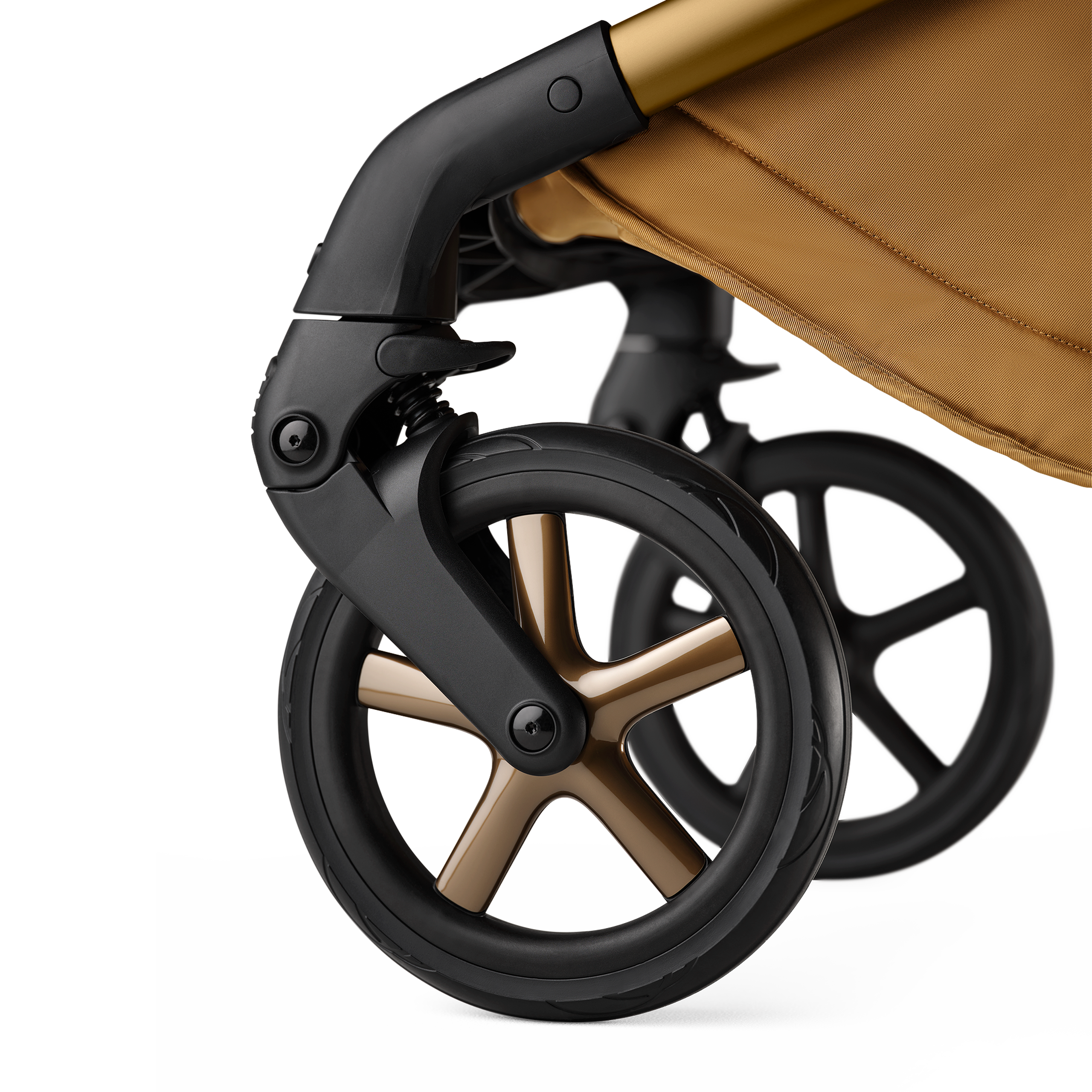 A close up of the wheels of the Bugaboo Fox 5 Noir Limited Edition Amber Glow. The wheel caps have polished rims. - Thumbnail Slide 12 of 15