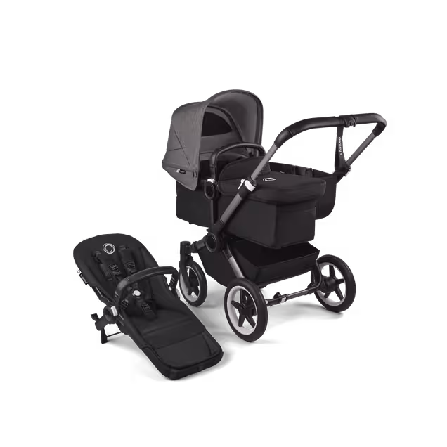 Refurbished Bugaboo Donkey 5 Mono bassinet and seat stroller graphite base, midnight black fabrics, grey mélange sun canopy - Main Image Slide 1 of 11