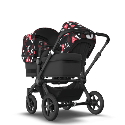 Bugaboo Donkey 5 Duo bassinet and seat stroller black base, midnight black fabrics, animal explorer pink/ red sun canopy - view 1