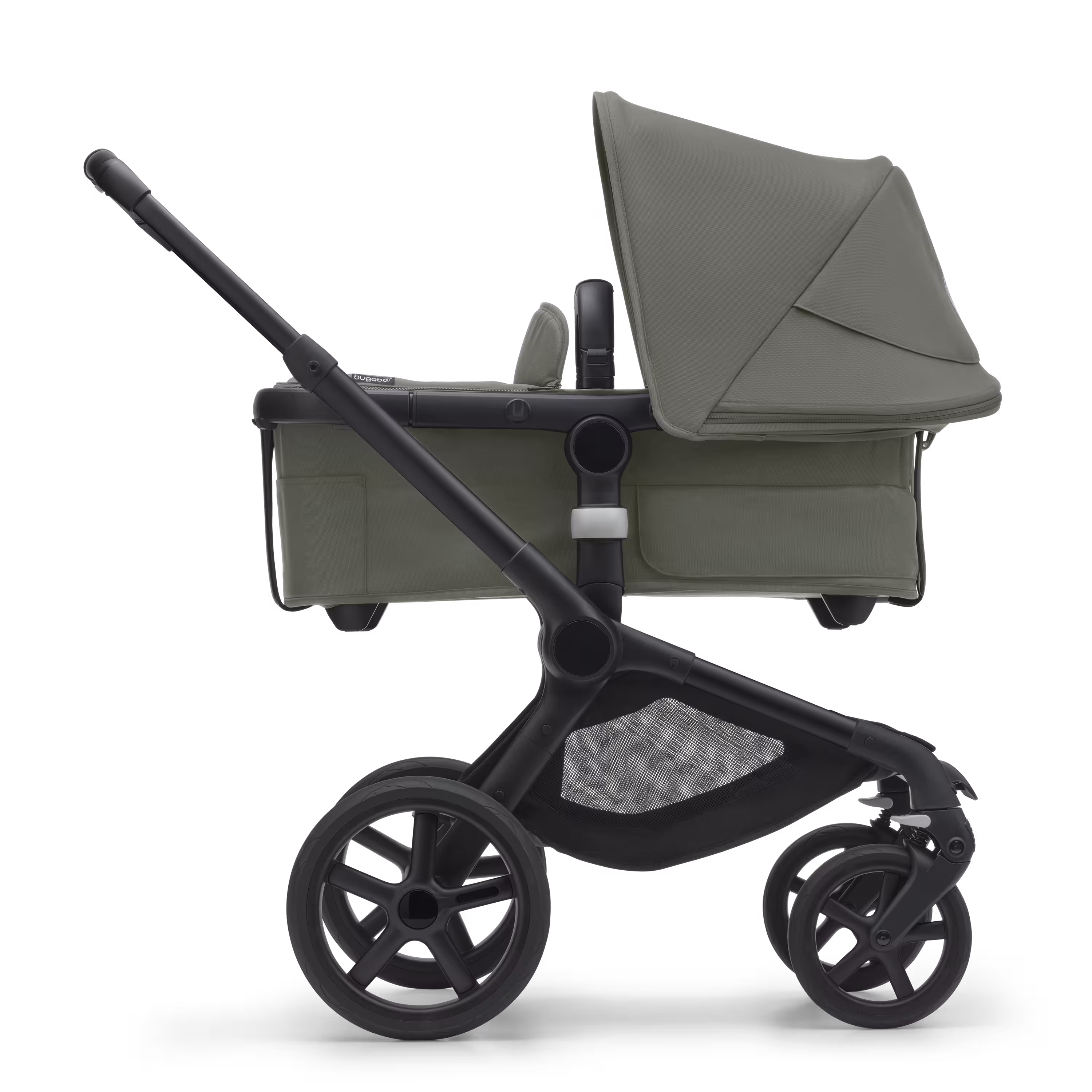 Side view of the Bugaboo Fox 5 bassinet pram with black chassis, forest green fabrics and forest green sun canopy. - Main Modal Image Slide 2 of 12