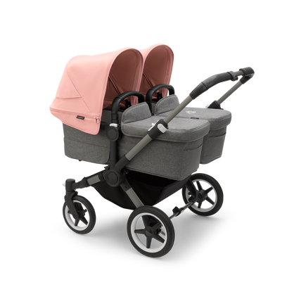 Bugaboo Donkey 5 Twin bassinet and seat stroller graphite base, grey mélange fabrics, morning pink sun canopy - view 1