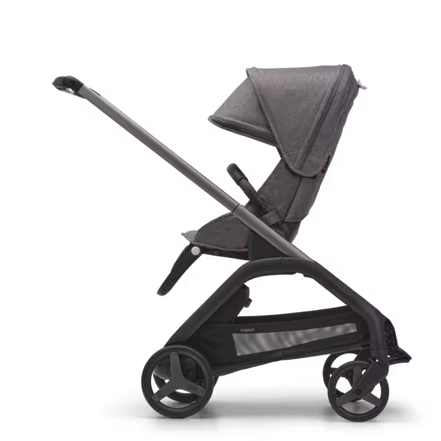 Side view of the Bugaboo Dragonfly seat pushchair with graphite chassis, grey melange fabrics and grey melange sun canopy. - Main Image Slide 2 of 16