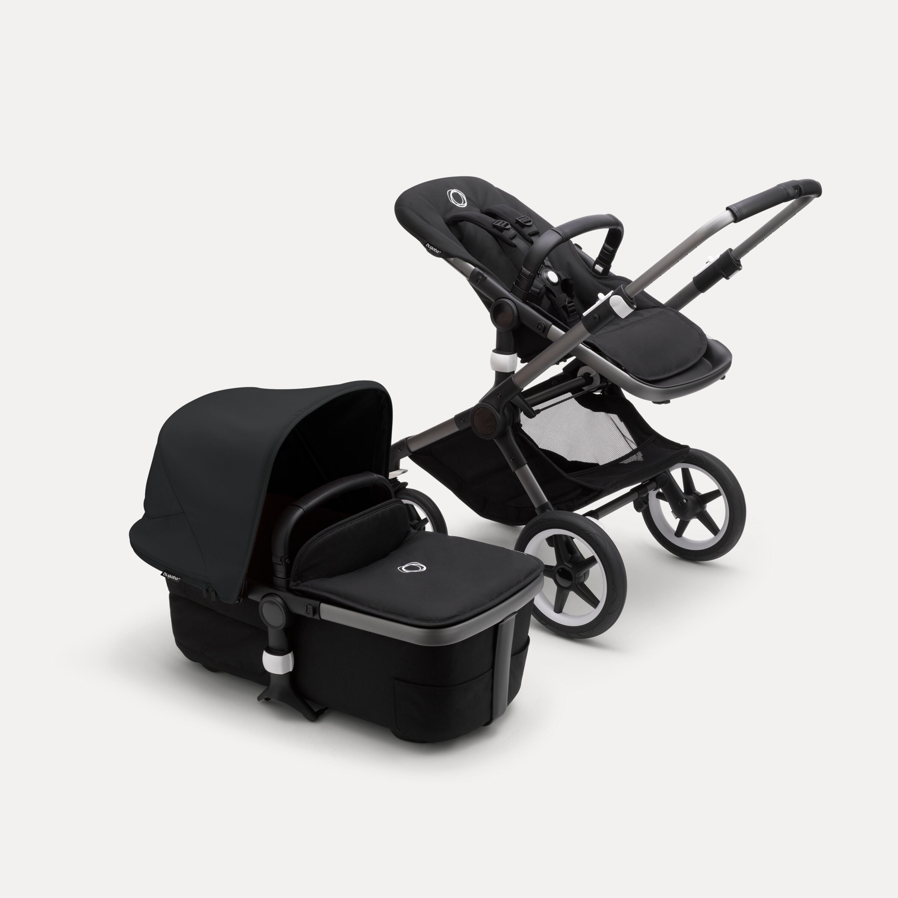 Bugaboo Fox 3 bassinet and seat stroller with graphite frame, black fabrics, and black sun canopy. - Main Modal Image Slide 6 of 7