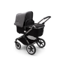 Bugaboo Fox 3 bassinet stroller with graphite frame, black fabrics, and grey sun canopy. - Thumbnail Slide 2 of 7