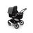 Bugaboo Fox 3 bassinet stroller with graphite frame, black fabrics, and grey sun canopy. - Thumbnail Slide 2 of 7