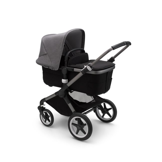 Bugaboo Fox 3 bassinet stroller with graphite frame, black fabrics, and grey sun canopy. - Main Image Slide 2 of 7