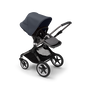 Bugaboo Fox 3 seat stroller with graphite frame, grey fabrics, and stormy blue sun canopy. - Thumbnail Slide 6 of 7