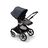 Bugaboo Fox 3 seat stroller with graphite frame, grey fabrics, and stormy blue sun canopy. - Thumbnail Slide 6 of 7