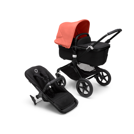 Bugaboo Fox 3 barnvagn med ligg- och sittdel med svart ram, svart klädsel och röd sufflett.