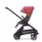Side view of the Bugaboo Dragonfly seat stroller with black chassis, grey melange fabrics and sunrise red sun canopy. - Thumbnail Slide 2 of 16