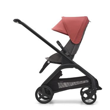 Side view of the Bugaboo Dragonfly seat stroller with black chassis, grey melange fabrics and sunrise red sun canopy. - view 2
