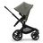 Side view of the Bugaboo Fox 5 seat pram with black chassis, forest green fabrics and forest green sun canopy. - Thumbnail Slide 3 of 12